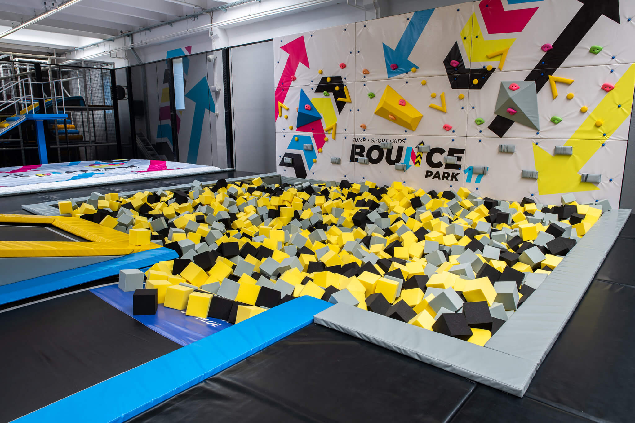 Square foam pit with climbing wall