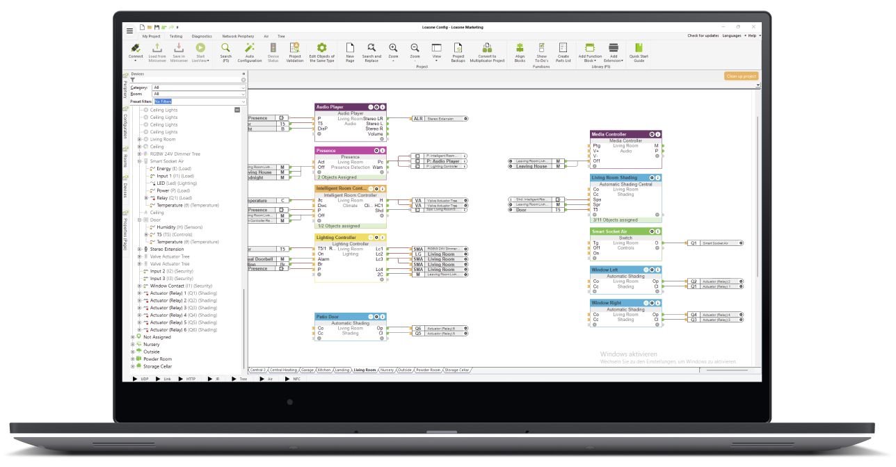 Open laptop with the Loxone Config software on the screen