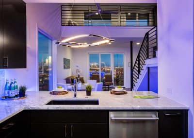 City condo with views enhanced by colorful LED lighting.