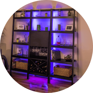 LED Strip lighting glowing behind bookcase shelves