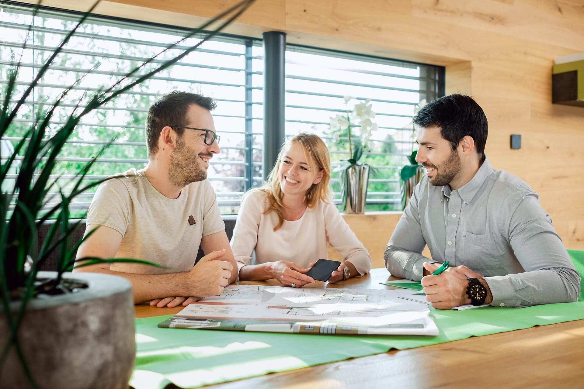 Loxone employee smiling with homeowners