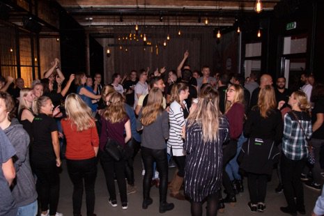 Loxone employees dancing at a party