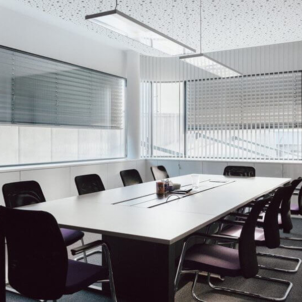 Automated blinds in office room