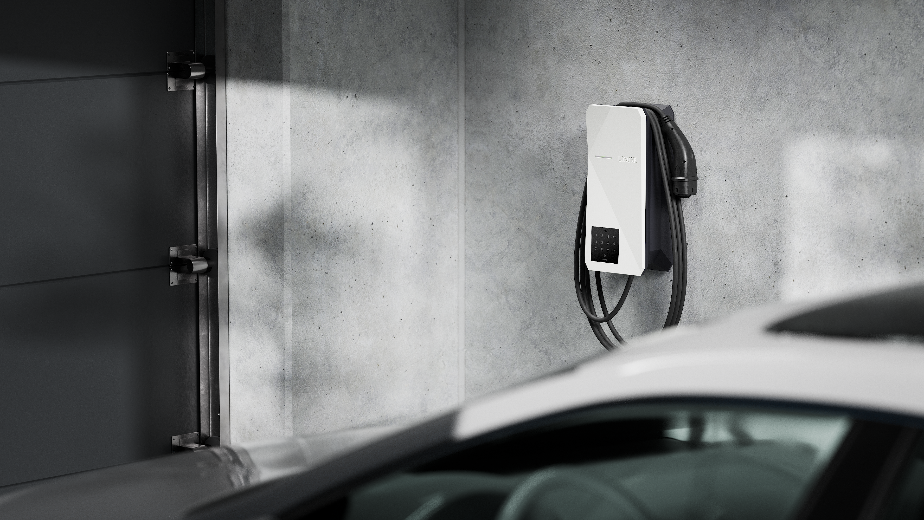 (c)Loxone_Wallbox_Garage A woman opens her hotel room with a key fob